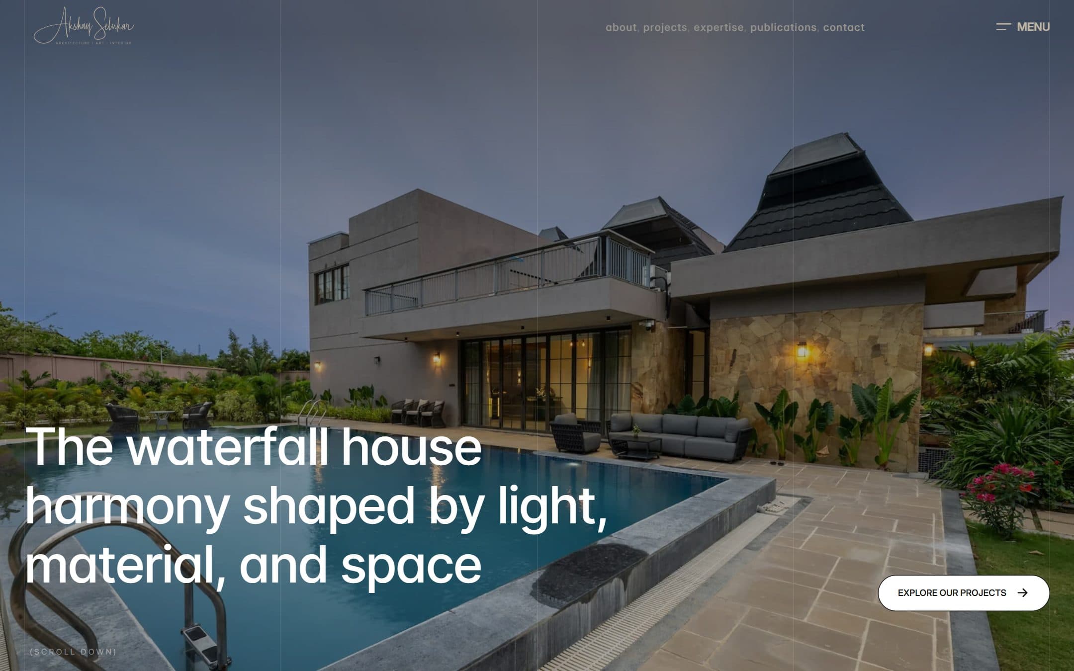 Akshay Selukar Studio homepage: 'The waterfall house' over a photograph of a house beside a pool at dusk